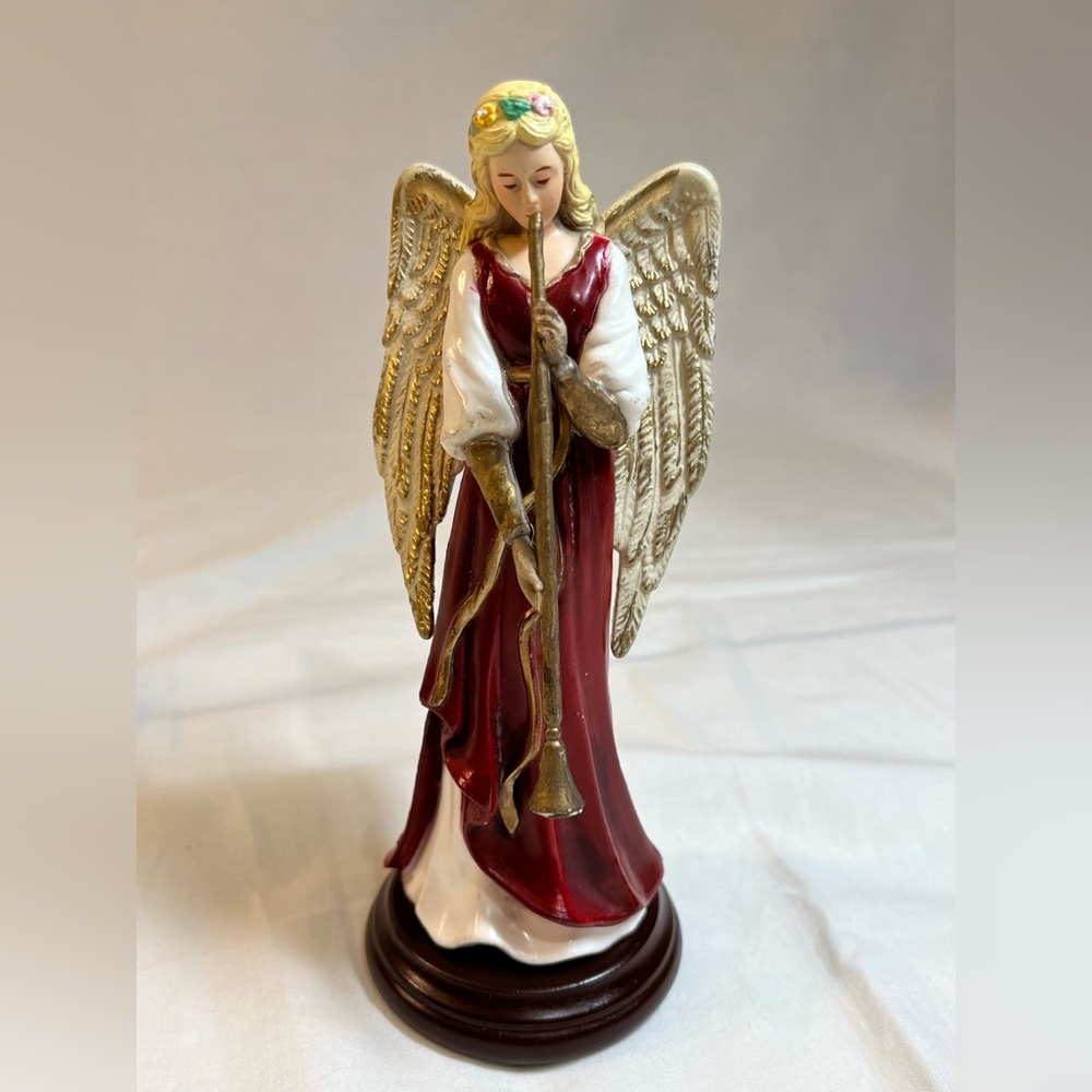 Vintage Angel figurine holding musical instrument. Resin. 6.5” H x 2.5”W
